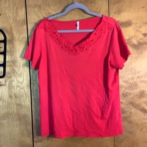 Red t-shirt with flower detailing by neckline
